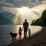 Család kutyával Glen Coe völgyében, szivárvány a hegyek fölött